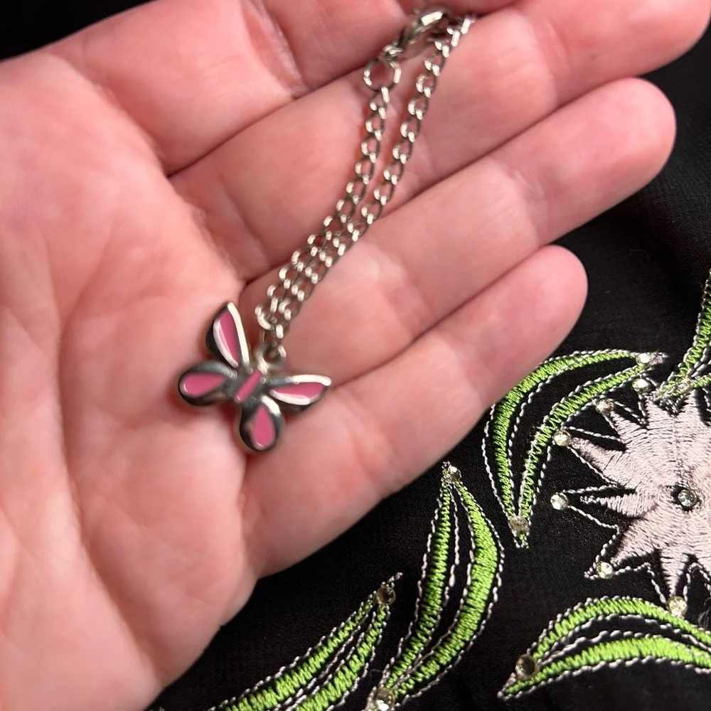 Cute unbranded Kids Silver Tone Metal Butterfly charm Bracelet.